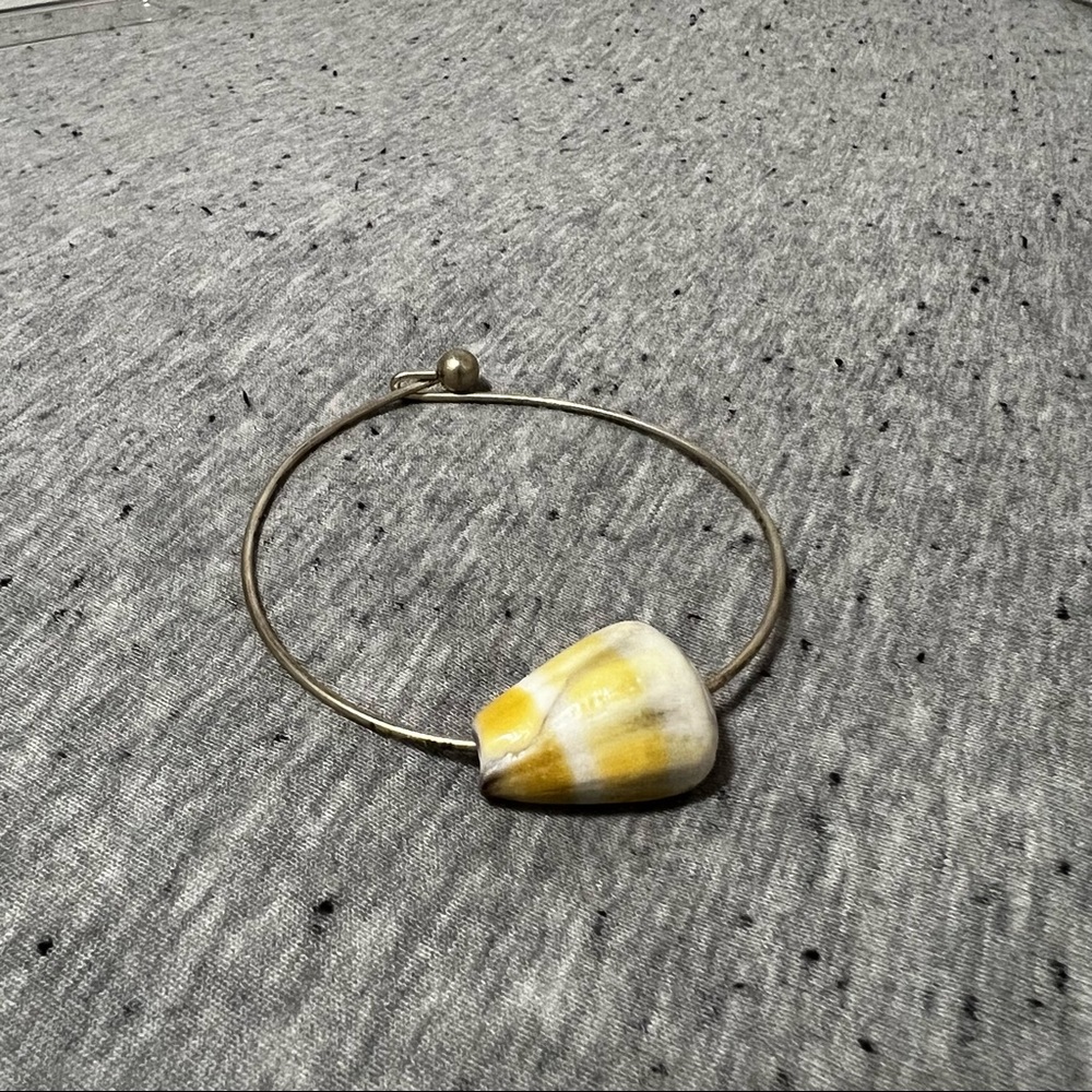 Cone shell bangle
